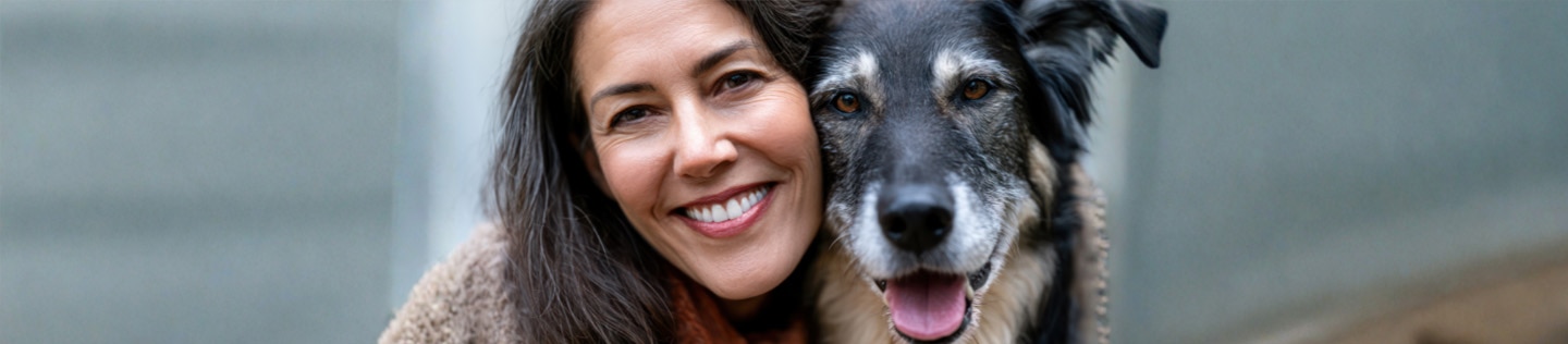 dog and woman close together