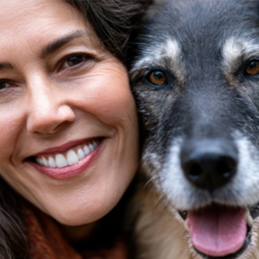 dog and woman close together